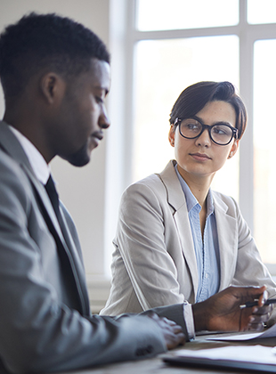 Men and Women working in a phone answering company