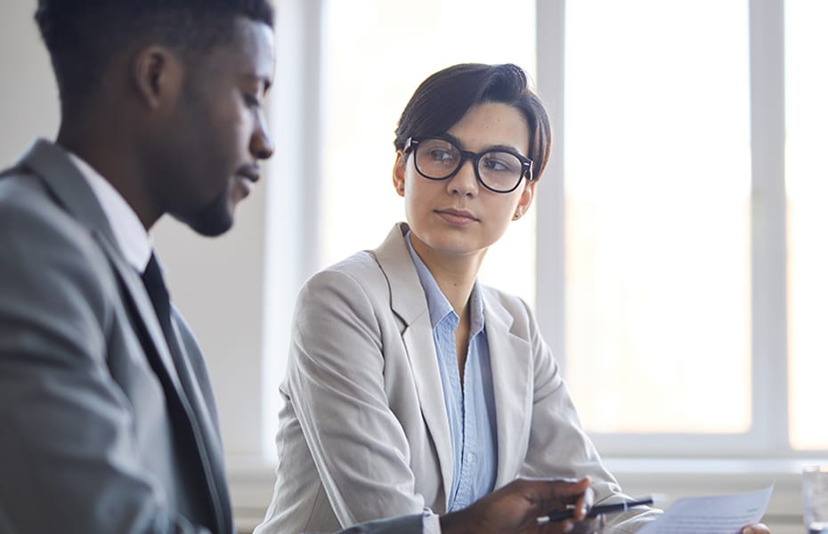 Men and Women working in a phone answering company