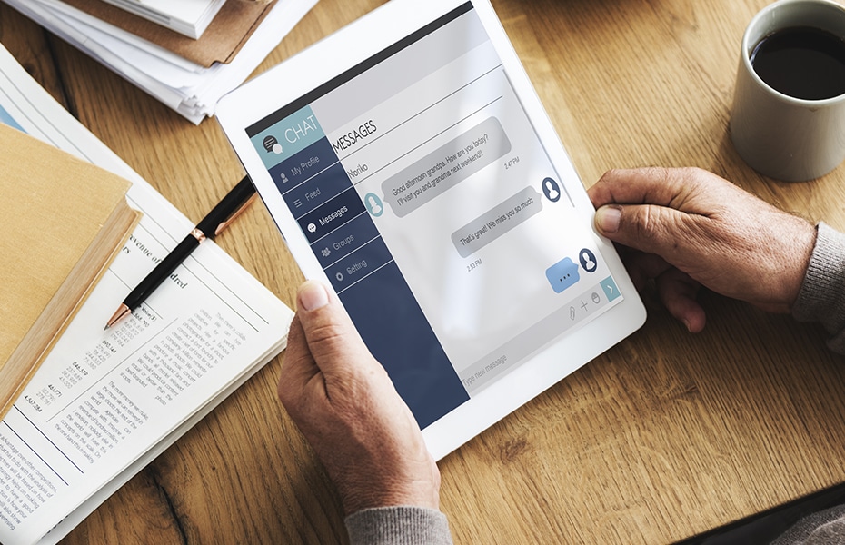 Men looking for webchat service on his iPad