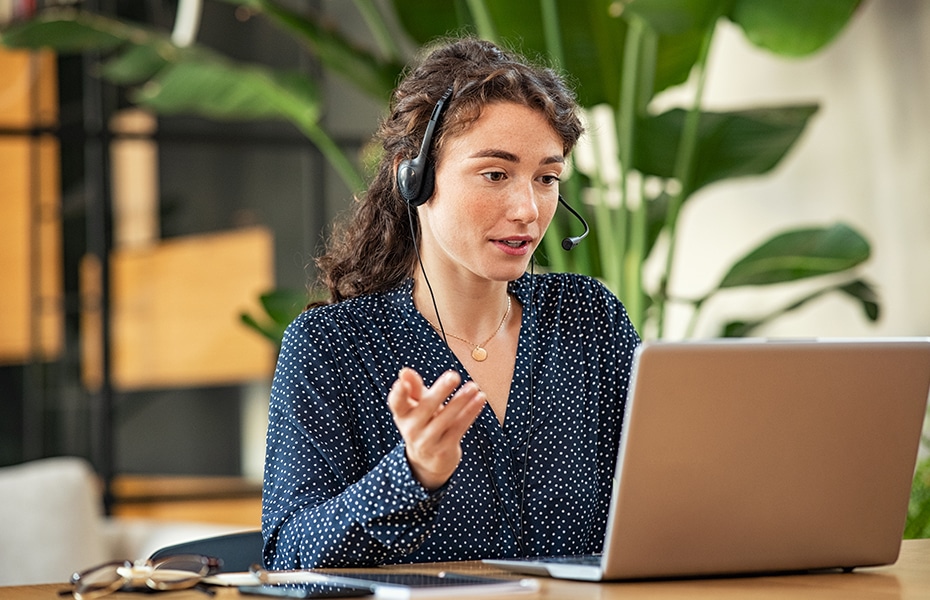 Girl working as virtual receptionists on a laptop