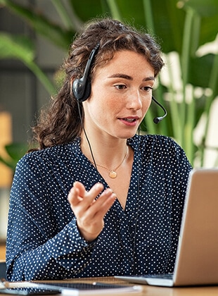 Girl working as virtual receptionists on a laptop