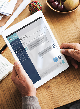 Men looking for webchat service on his iPad